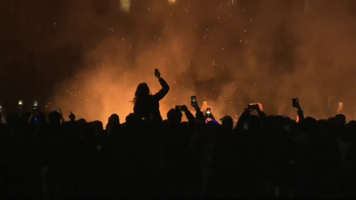 Crowd cheering at a rock concert