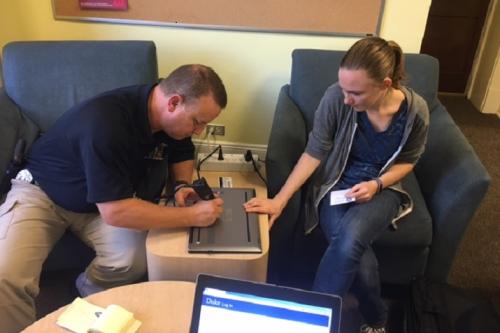 Duke Police engraving a laptop